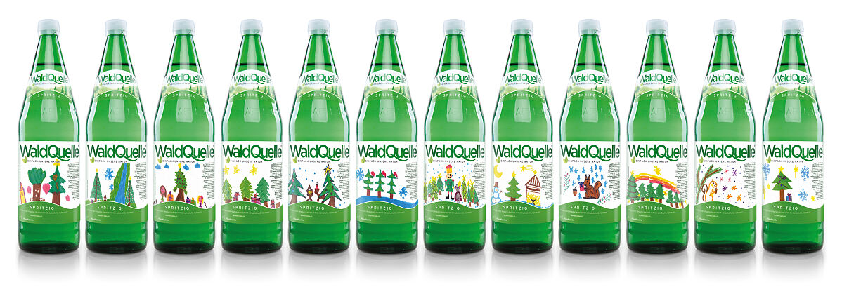 Bild 2: Spritzige Kunstwerke - im Dezember zieren Kinderzeichnungen die Waldquelle Glasflaschen